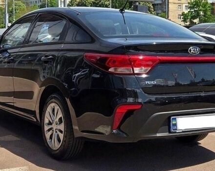 Чорний Кіа Ріо, об'ємом двигуна 1.37 л та пробігом 63 тис. км за 10000 $, фото 3 на Automoto.ua
