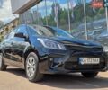 Чорний Кіа Ріо, об'ємом двигуна 1.4 л та пробігом 61 тис. км за 10500 $, фото 1 на Automoto.ua