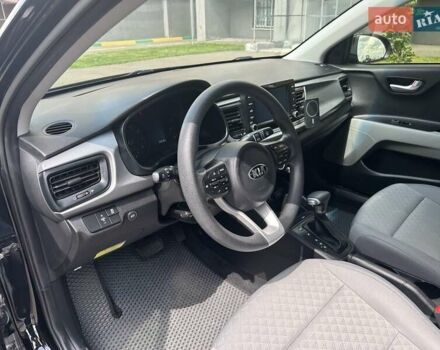 Чорний Кіа Ріо, об'ємом двигуна 1.59 л та пробігом 55 тис. км за 14150 $, фото 7 на Automoto.ua