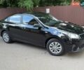 Черный Киа Рио, объемом двигателя 1.37 л и пробегом 63 тыс. км за 14000 $, фото 6 на Automoto.ua