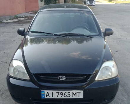 Черный Киа Рио, объемом двигателя 1.34 л и пробегом 230 тыс. км за 3400 $, фото 3 на Automoto.ua