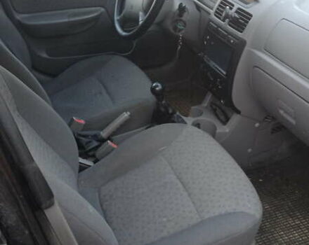 Черный Киа Рио, объемом двигателя 1.34 л и пробегом 230 тыс. км за 3400 $, фото 2 на Automoto.ua