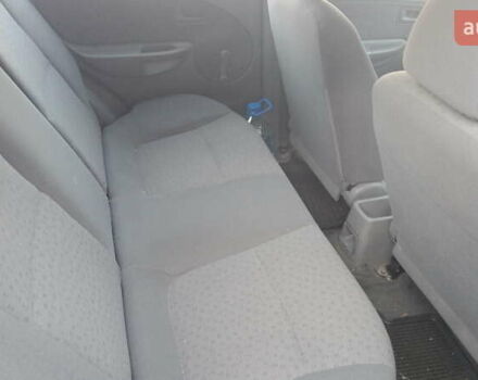 Черный Киа Рио, объемом двигателя 1.34 л и пробегом 230 тыс. км за 3400 $, фото 6 на Automoto.ua