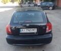Чорний Кіа Ріо, об'ємом двигуна 1.34 л та пробігом 230 тис. км за 3400 $, фото 5 на Automoto.ua