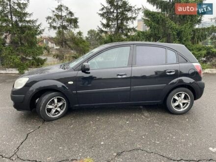 Черный Киа Рио, объемом двигателя 1.4 л и пробегом 270 тыс. км за 3550 $, фото 1 на Automoto.ua