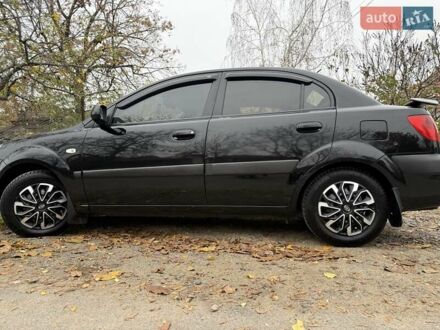 Чорний Кіа Ріо, об'ємом двигуна 1.4 л та пробігом 200 тис. км за 5000 $, фото 1 на Automoto.ua