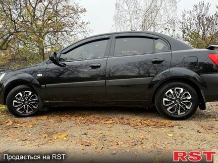 Черный Киа Рио, объемом двигателя 1.4 л и пробегом 199 тыс. км за 5500 $, фото 1 на Automoto.ua
