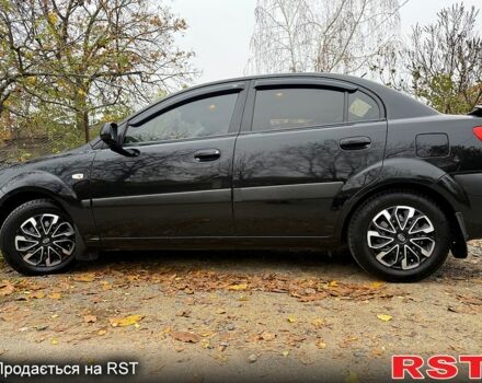 Черный Киа Рио, объемом двигателя 1.4 л и пробегом 199 тыс. км за 5500 $, фото 1 на Automoto.ua