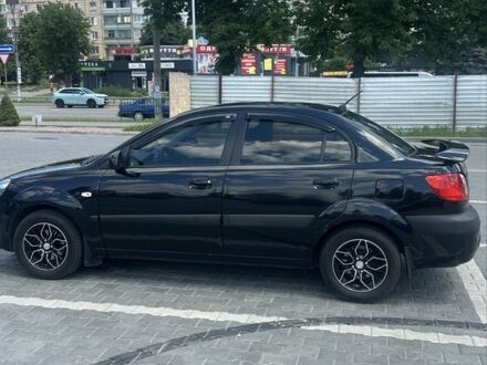 Черный Киа Рио, объемом двигателя 1.4 л и пробегом 213 тыс. км за 5124 $, фото 1 на Automoto.ua