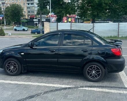 Черный Киа Рио, объемом двигателя 1.4 л и пробегом 213 тыс. км за 5700 $, фото 1 на Automoto.ua