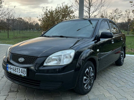 Черный Киа Рио, объемом двигателя 1.4 л и пробегом 297 тыс. км за 3999 $, фото 1 на Automoto.ua