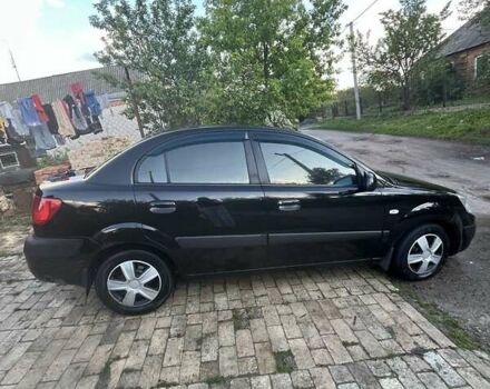 Чорний Кіа Ріо, об'ємом двигуна 1.4 л та пробігом 249 тис. км за 3500 $, фото 1 на Automoto.ua