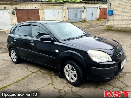 Черный Киа Рио, объемом двигателя 1.4 л и пробегом 110 тыс. км за 6399 $, фото 1 на Automoto.ua