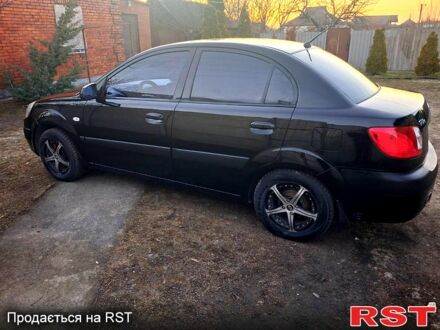 Чорний Кіа Ріо, об'ємом двигуна 1.4 л та пробігом 320 тис. км за 4400 $, фото 1 на Automoto.ua