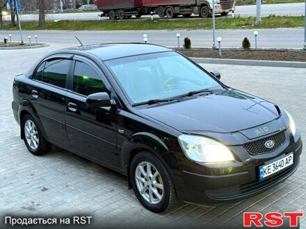 Черный Киа Рио, объемом двигателя 1.4 л и пробегом 230 тыс. км за 5800 $, фото 1 на Automoto.ua