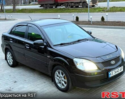 Черный Киа Рио, объемом двигателя 1.4 л и пробегом 230 тыс. км за 5800 $, фото 1 на Automoto.ua
