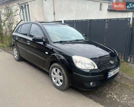 Чорний Кіа Ріо, об'ємом двигуна 1.4 л та пробігом 152 тис. км за 4500 $, фото 1 на Automoto.ua