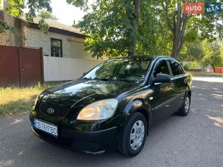 Чорний Кіа Ріо, об'ємом двигуна 1.4 л та пробігом 235 тис. км за 2900 $, фото 1 на Automoto.ua
