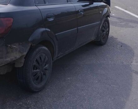 Чорний Кіа Ріо, об'ємом двигуна 1.4 л та пробігом 100 тис. км за 1200 $, фото 1 на Automoto.ua