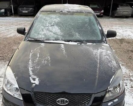 Чорний Кіа Ріо, об'ємом двигуна 1.4 л та пробігом 245 тис. км за 4300 $, фото 1 на Automoto.ua