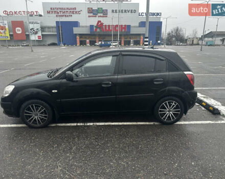 Чорний Кіа Ріо, об'ємом двигуна 1.4 л та пробігом 208 тис. км за 5400 $, фото 1 на Automoto.ua