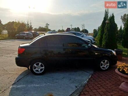 Чорний Кіа Ріо, об'ємом двигуна 1.4 л та пробігом 196 тис. км за 4200 $, фото 1 на Automoto.ua