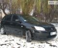 Чорний Кіа Ріо, об'ємом двигуна 1.4 л та пробігом 84 тис. км за 5999 $, фото 1 на Automoto.ua