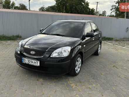 Черный Киа Рио, объемом двигателя 1.4 л и пробегом 163 тыс. км за 4999 $, фото 1 на Automoto.ua