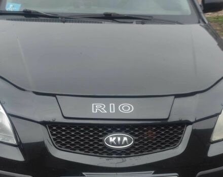 Чорний Кіа Ріо, об'ємом двигуна 1.4 л та пробігом 229 тис. км за 4200 $, фото 1 на Automoto.ua