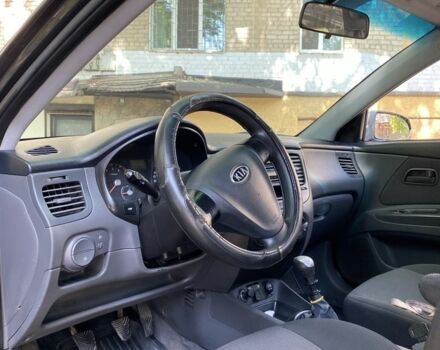 Чорний Кіа Ріо, об'ємом двигуна 1.4 л та пробігом 260 тис. км за 3100 $, фото 1 на Automoto.ua