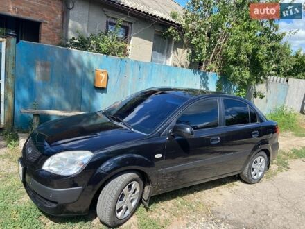 Черный Киа Рио, объемом двигателя 1.4 л и пробегом 214 тыс. км за 4600 $, фото 1 на Automoto.ua