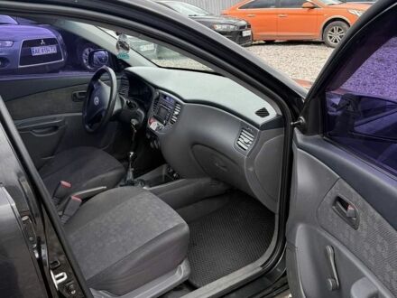 Черный Киа Рио, объемом двигателя 1.4 л и пробегом 250 тыс. км за 2600 $, фото 1 на Automoto.ua