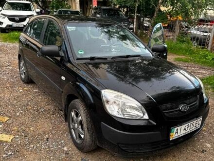 Черный Киа Рио, объемом двигателя 1.4 л и пробегом 270 тыс. км за 5100 $, фото 1 на Automoto.ua