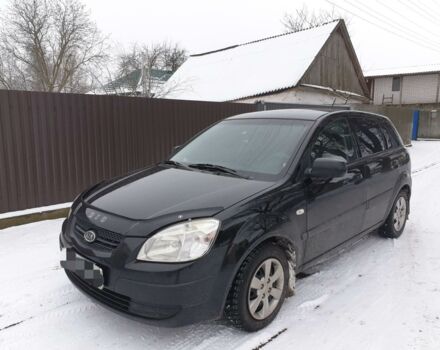 Черный Киа Рио, объемом двигателя 1.4 л и пробегом 164 тыс. км за 4999 $, фото 1 на Automoto.ua