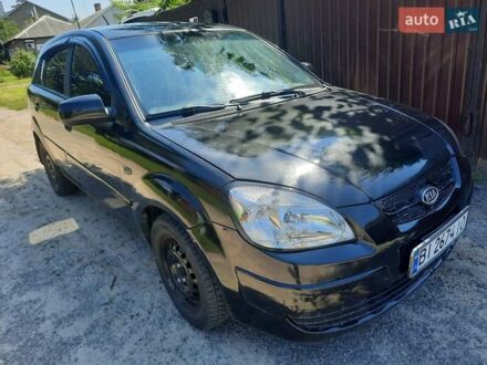Черный Киа Рио, объемом двигателя 1.4 л и пробегом 390 тыс. км за 3500 $, фото 1 на Automoto.ua