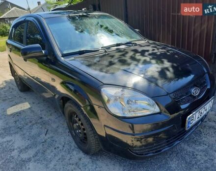 Черный Киа Рио, объемом двигателя 1.4 л и пробегом 390 тыс. км за 3500 $, фото 1 на Automoto.ua