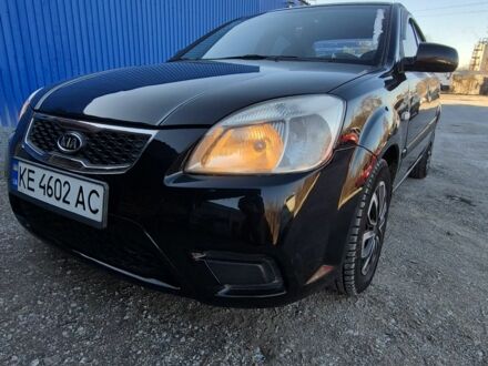 Черный Киа Рио, объемом двигателя 1.4 л и пробегом 220 тыс. км за 4400 $, фото 1 на Automoto.ua