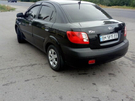 Черный Киа Рио, объемом двигателя 1.4 л и пробегом 85 тыс. км за 6000 $, фото 1 на Automoto.ua