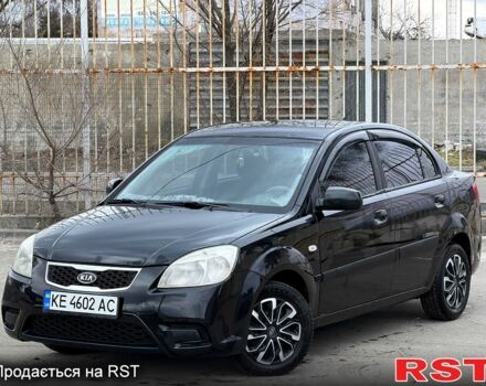 Чорний Кіа Ріо, об'ємом двигуна 1.4 л та пробігом 220 тис. км за 4700 $, фото 1 на Automoto.ua