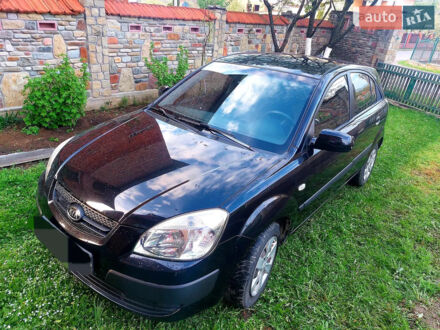 Черный Киа Рио, объемом двигателя 1.4 л и пробегом 290 тыс. км за 4600 $, фото 1 на Automoto.ua