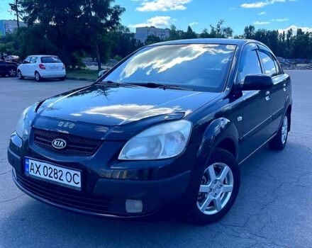 Чорний Кіа Ріо, об'ємом двигуна 1.4 л та пробігом 277 тис. км за 4600 $, фото 1 на Automoto.ua