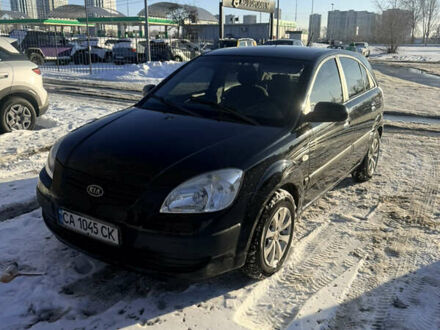 Чорний Кіа Ріо, об'ємом двигуна 1.4 л та пробігом 208 тис. км за 6200 $, фото 1 на Automoto.ua