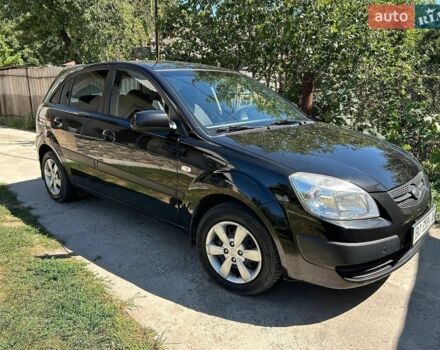 Чорний Кіа Ріо, об'ємом двигуна 1.4 л та пробігом 214 тис. км за 5100 $, фото 1 на Automoto.ua