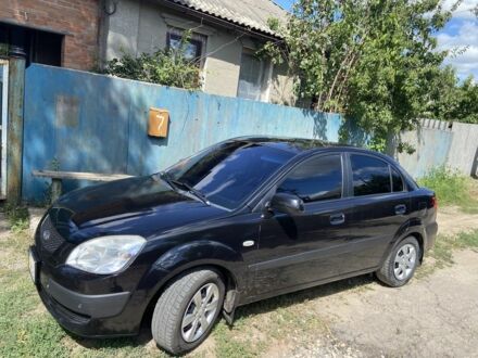 Чорний Кіа Ріо, об'ємом двигуна 1.4 л та пробігом 214 тис. км за 4598 $, фото 1 на Automoto.ua
