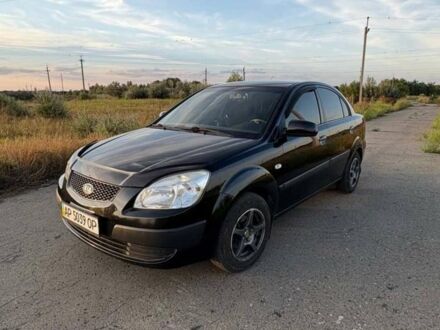 Чорний Кіа Ріо, об'ємом двигуна 1.4 л та пробігом 168 тис. км за 5500 $, фото 1 на Automoto.ua