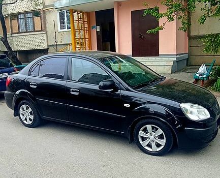 Чорний Кіа Ріо, об'ємом двигуна 1.4 л та пробігом 270 тис. км за 3550 $, фото 1 на Automoto.ua