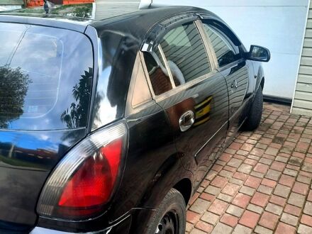 Черный Киа Рио, объемом двигателя 1.4 л и пробегом 392 тыс. км за 3700 $, фото 1 на Automoto.ua