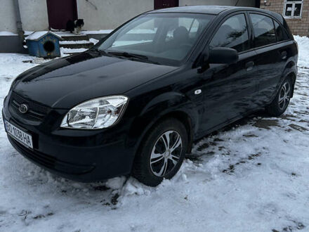 Черный Киа Рио, объемом двигателя 1.4 л и пробегом 220 тыс. км за 4400 $, фото 1 на Automoto.ua