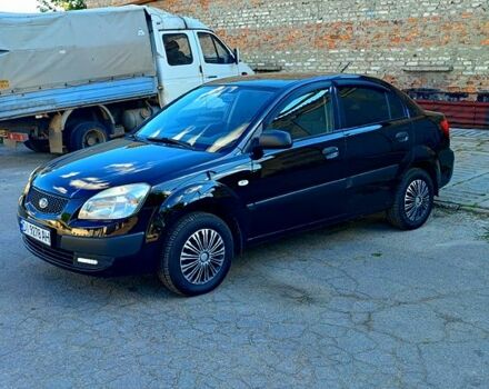 Черный Киа Рио, объемом двигателя 1.4 л и пробегом 260 тыс. км за 3100 $, фото 1 на Automoto.ua