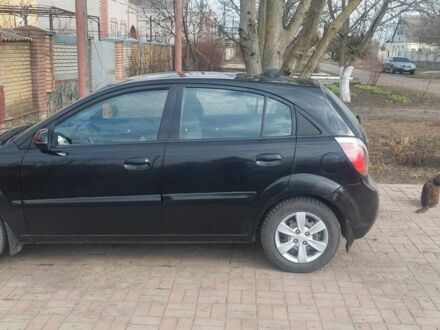 Черный Киа Рио, объемом двигателя 1.4 л и пробегом 180 тыс. км за 6000 $, фото 1 на Automoto.ua